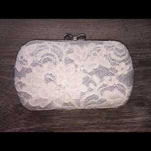 White Lace with Rhinestone Bow Closure Clutch